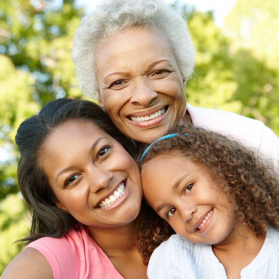 Family portrait surrounded by greenery